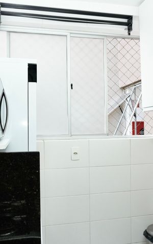 Apartamento à venda com 66m², 3 quartos e 1 vaga Apartamento à venda com 66m², 3 quartos e 1 vagaCozinha e Área de Serviço