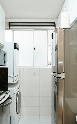 Apartamento à venda com 66m², 3 quartos e 1 vaga Apartamento à venda com 66m², 3 quartos e 1 vagaCozinha e Área de Serviço