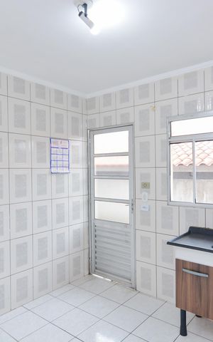 Casa de condomínio para alugar com 104m², 2 quartos e 2 vagasCozinha