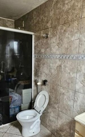 Casa à venda com 396m², 4 quartos e 4 vagas Casa à venda com 396m², 4 quartos e 4 vagasBanheiro