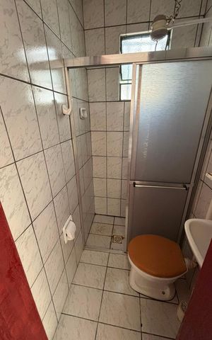 Casa à venda com 260m², 3 quartos e 2 vagas Casa à venda com 260m², 3 quartos e 2 vagasBanheiro 1