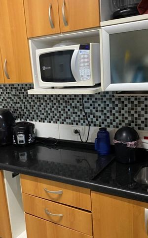 Casa de condomínio à venda com 65m², 2 quartos e 1 vaga Casa de condomínio à venda com 65m², 2 quartos e 1 vagaCozinha