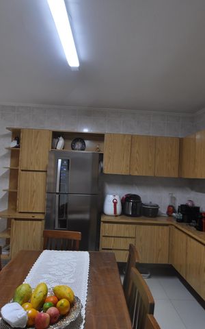 Casa para alugar com 100m², 3 quartos e 2 vagasCozinha