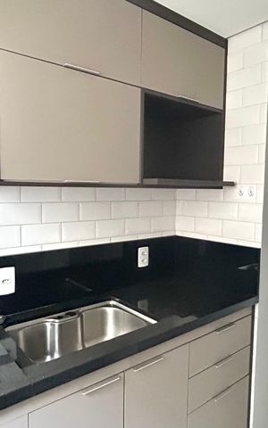 Apartamento para alugar com 48m², 2 quartos e 1 vaga Apartamento para alugar com 48m², 2 quartos e 1 vagaCozinha e Área de Serviço