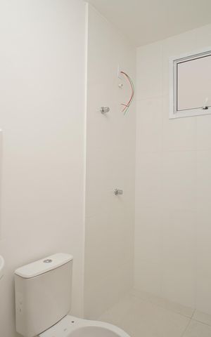 Casa de condomínio para alugar com 52m², 2 quartos e 1 vaga Casa de condomínio para alugar com 52m², 2 quartos e 1 vagaBanheiro do Quarto 1