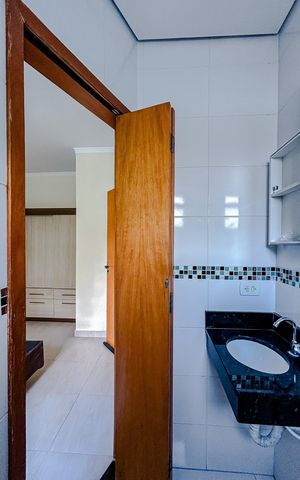 Casa para alugar com 70m², 2 quartos e 2 vagasBanheiro da Suíte 1