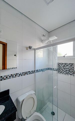 Casa para alugar com 70m², 2 quartos e 2 vagasBanheiro da Suíte 1