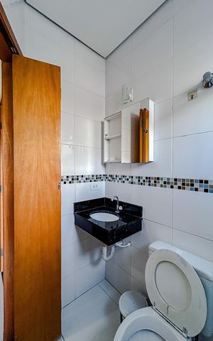 Casa para alugar com 70m², 2 quartos e 2 vagasBanheiro da Suíte 1