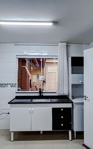 Casa para alugar com 70m², 2 quartos e 2 vagasCozinha