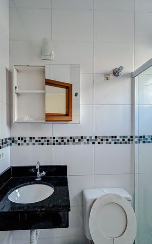 Casa para alugar com 70m², 2 quartos e 2 vagasBanheiro da Suíte 1