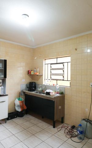 Casa à venda com 139m², 2 quartos e 2 vagas Casa à venda com 139m², 2 quartos e 2 vagasCozinha