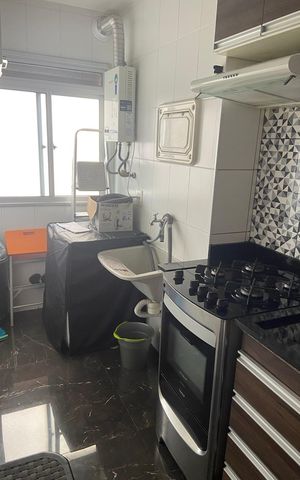 Apartamento à venda com 49m², 2 quartos e 1 vaga Apartamento à venda com 49m², 2 quartos e 1 vagaCozinha/Área de Serviço