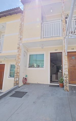 Casa de condomínio à venda com 65m², 2 quartos e 1 vagaFachada