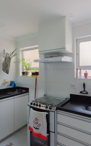 Apartamento à venda com 52m², 2 quartos e 1 vaga Apartamento à venda com 52m², 2 quartos e 1 vagaCozinha e Área de Serviço
