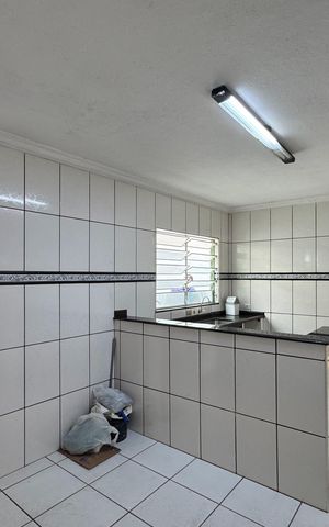 Casa à venda com 130m², 2 quartos e 2 vagas Casa à venda com 130m², 2 quartos e 2 vagasCozinha