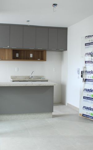 Apartamento à venda com 59m², 2 quartos e 1 vagaSala e Cozinha ao fundo