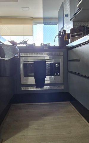 Apartamento à venda com 63m², 2 quartos e 1 vaga Apartamento à venda com 63m², 2 quartos e 1 vagaSala Cozinha e Varanda integrada