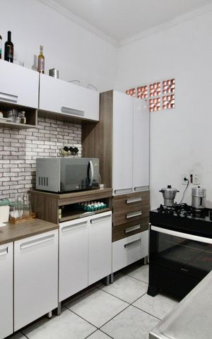 Casa à venda com 165m², 5 quartos e 2 vagas Casa à venda com 165m², 5 quartos e 2 vagasCozinha
