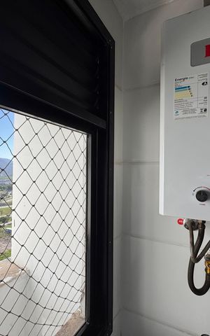 Apartamento à venda com 80m², 3 quartos e 1 vaga Apartamento à venda com 80m², 3 quartos e 1 vagaCozinha e Área de Serviço