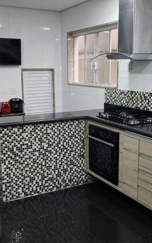 Casa de condomínio à venda com 360m², 4 quartos e 5 vagas Casa de condomínio à venda com 360m², 4 quartos e 5 vagasCozinha