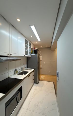 Apartamento à venda com 42m², 2 quartos e 1 vaga Apartamento à venda com 42m², 2 quartos e 1 vagaCozinha e Área de Serviço