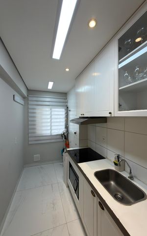Apartamento à venda com 42m², 2 quartos e 1 vaga Apartamento à venda com 42m², 2 quartos e 1 vagaCozinha e Área de Serviço
