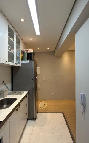 Apartamento à venda com 42m², 2 quartos e 1 vaga Apartamento à venda com 42m², 2 quartos e 1 vagaCozinha e Área de Serviço