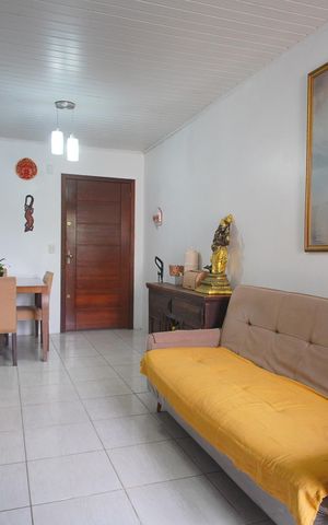 Casa à venda com 76m², 2 quartos e 1 vagaSala/Cozinha