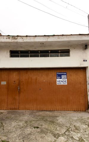 Casa à venda com 153m², 4 quartos e 2 vagas Casa à venda com 153m², 4 quartos e 2 vagasFachada