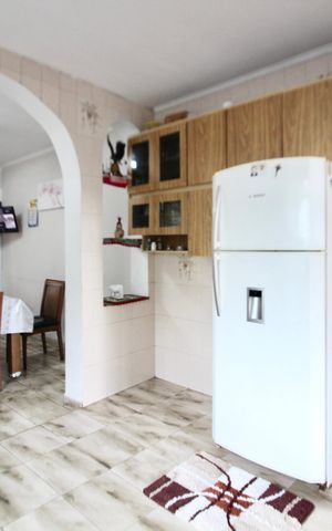 Casa à venda com 153m², 4 quartos e 2 vagas Casa à venda com 153m², 4 quartos e 2 vagasCozinha