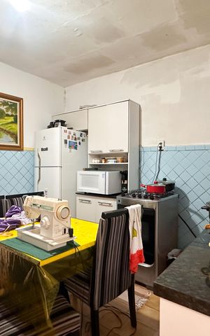 Casa à venda com 112m², 2 quartos e 2 vagas Casa à venda com 112m², 2 quartos e 2 vagasCozinha
