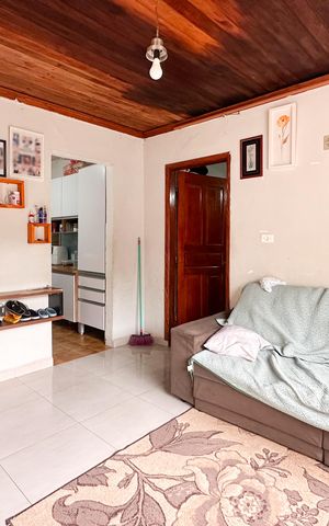Casa à venda com 112m², 2 quartos e 2 vagas Casa à venda com 112m², 2 quartos e 2 vagasSala