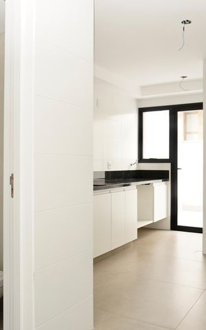 Apartamento à venda com 135m², 3 quartos e 2 vagas Apartamento à venda com 135m², 3 quartos e 2 vagasCozinha e Área de Serviço