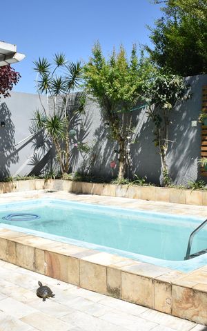 Casa à venda com 280m², 4 quartos e 4 vagasPiscina