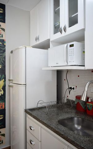 Apartamento para alugar com 54m², 2 quartos e 2 vagasCozinha - pavimento superior