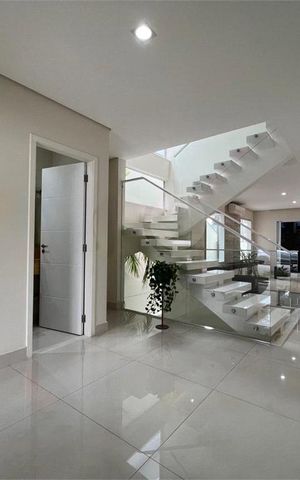 Casa de condomínio à venda com 287m², 4 quartos e 5 vagas