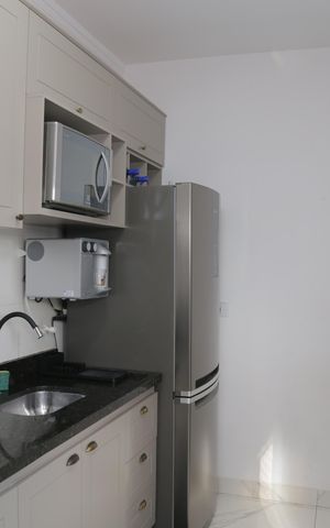 Casa de condomínio à venda com 46m², 2 quartos e 1 vaga Casa de condomínio à venda com 46m², 2 quartos e 1 vagaCozinha