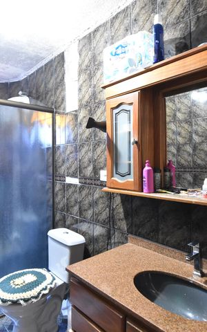 Casa à venda com 360m², 4 quartos e 4 vagasBanheiro