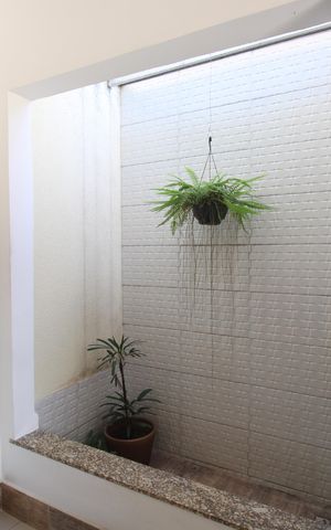 Casa de condomínio à venda com 130m², 2 quartos e 3 vagasSala