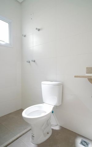 Apartamento à venda com 67m², 2 quartos e 2 vagasBanheiro da suíte 1
