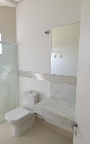 Casa de condomínio à venda com 300m², 3 quartos e 4 vagasBanheiro Suíte