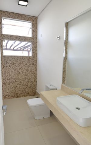 Casa de condomínio à venda com 300m², 3 quartos e 4 vagasLavabo