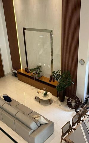 Casa de condomínio à venda com 460m², 4 quartos e 3 vagas Casa de condomínio à venda com 460m², 4 quartos e 3 vagasSala