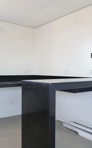 Apartamento à venda com 64m², 2 quartos e 2 vagasCozinha e Área de Serviço