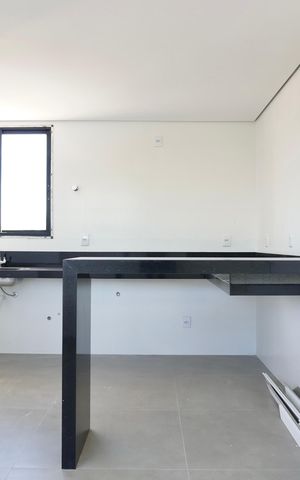 Apartamento à venda com 64m², 2 quartos e 2 vagasCozinha e Área de Serviço
