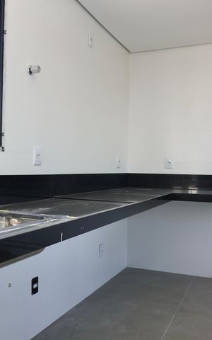 Apartamento à venda com 64m², 2 quartos e 2 vagasCozinha e Área de Serviço