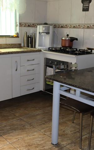Casa à venda com 89m², 2 quartos e 2 vagasCozinha