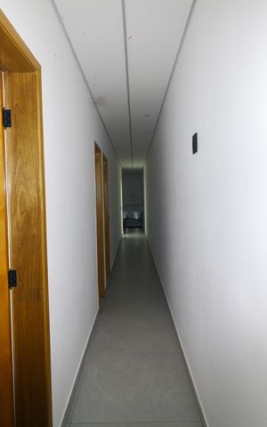 Casa à venda com 130m², 3 quartos e 4 vagas Casa à venda com 130m², 3 quartos e 4 vagasCorredor