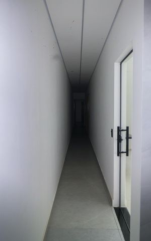 Casa à venda com 130m², 3 quartos e 4 vagas Casa à venda com 130m², 3 quartos e 4 vagasCorredor