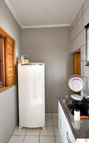 Casa à venda com 150m², 2 quartos e 2 vagas Casa à venda com 150m², 2 quartos e 2 vagasCozinha